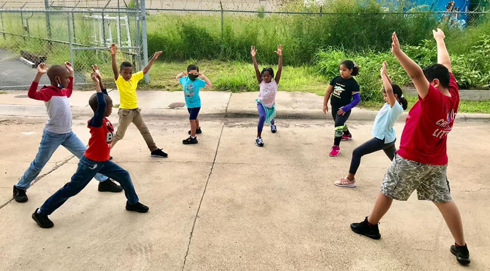Children exercising together at Get Healthy Kidz camp